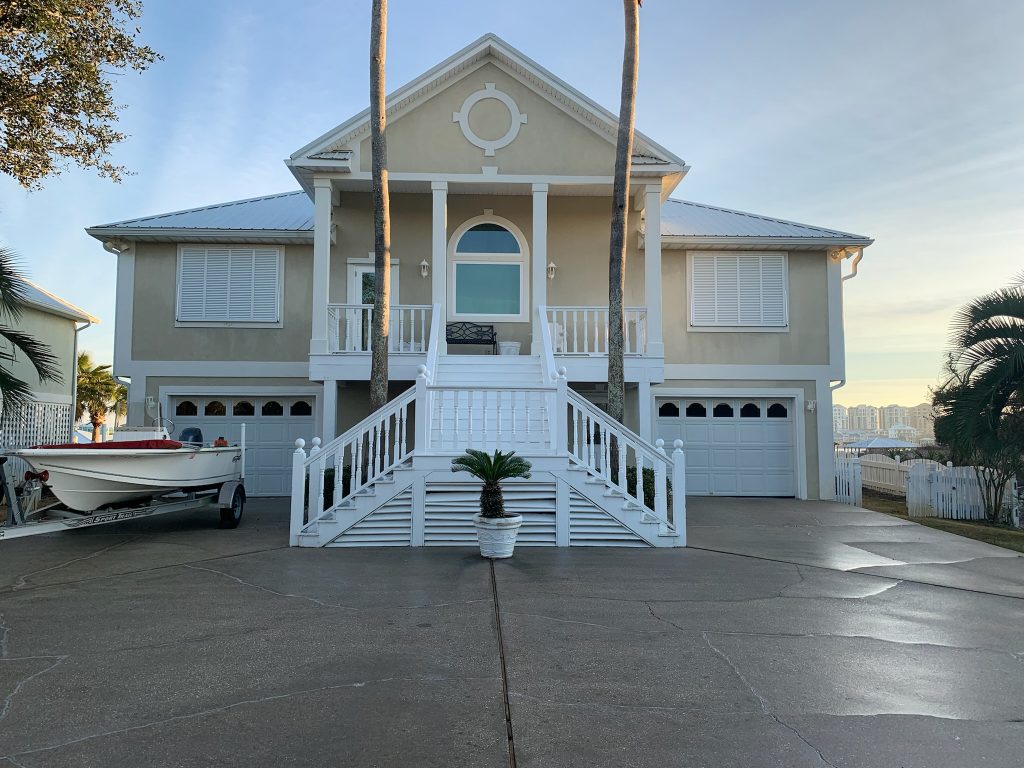 Gulf Pro Wash cleaned this Orange Beach home and driveway