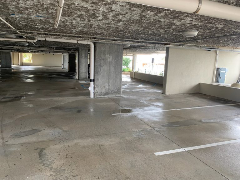 Pressure Washing a parking garage