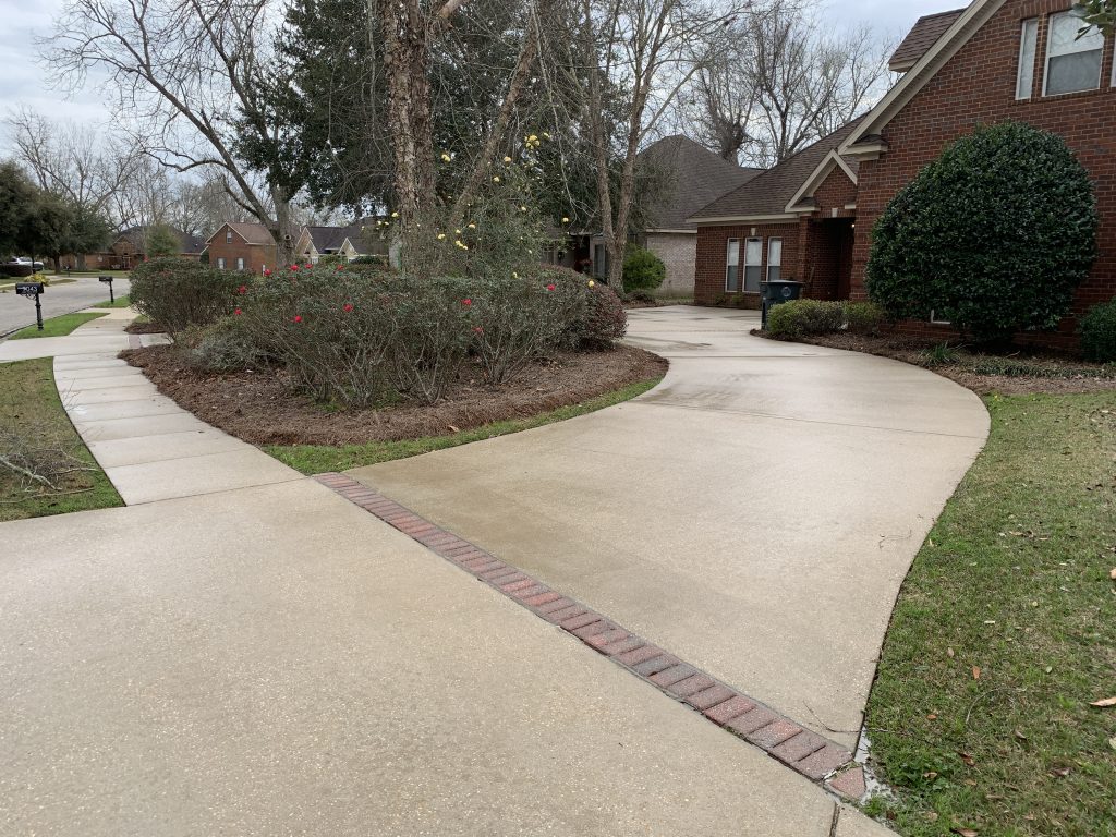 Pressure washing a driveway in Gulf Shores