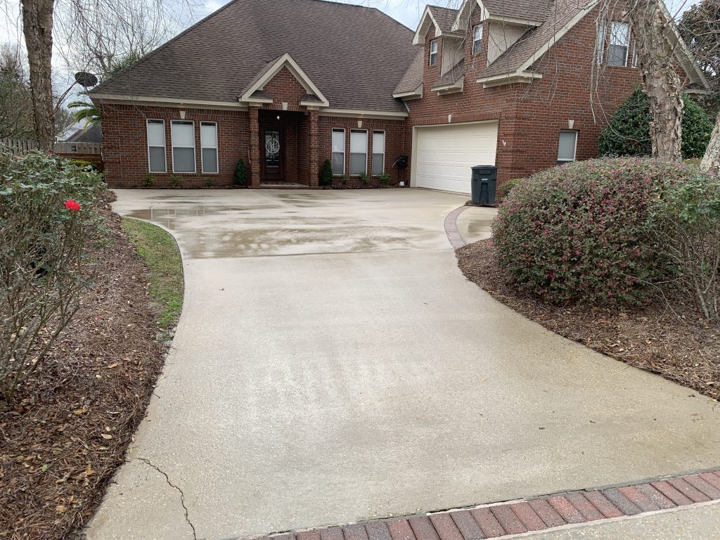 Pressure Washing a driveway in Gulf Shores