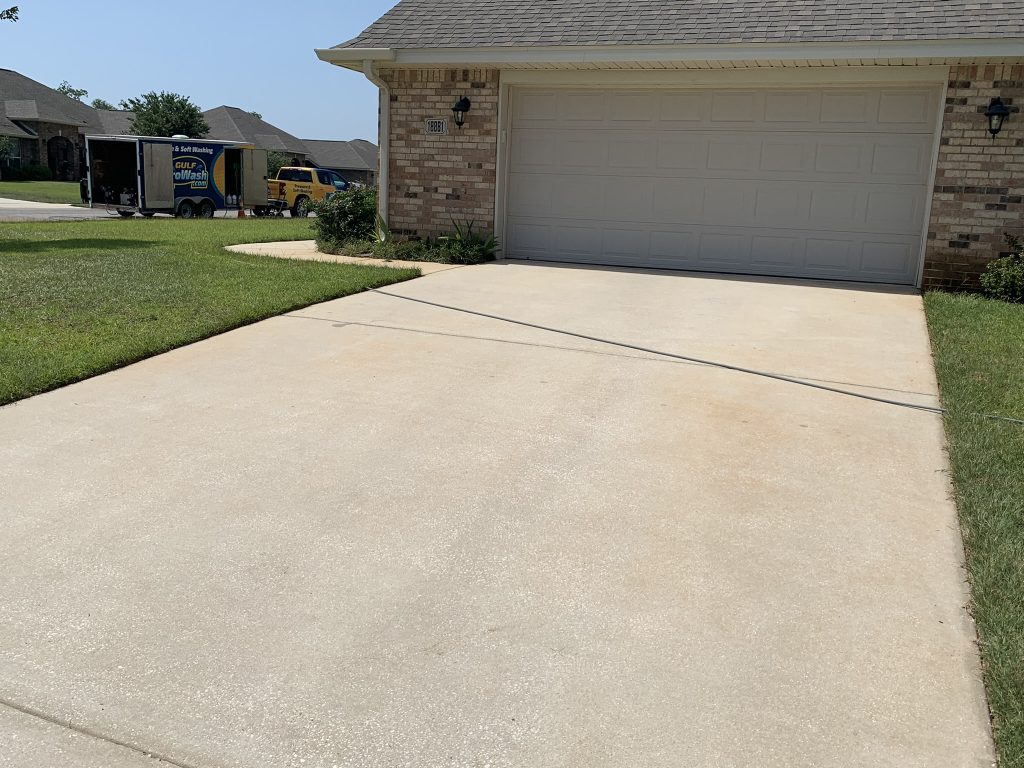 Pressure washing a driveway in Gulf Shores