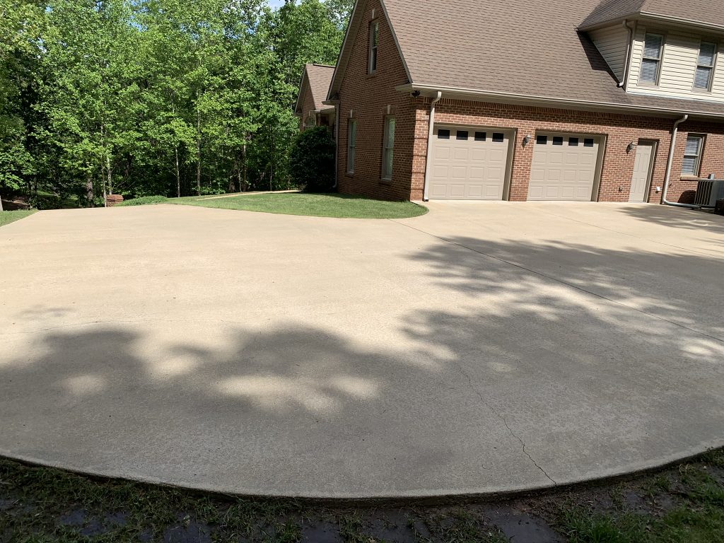 Pressure washing in driveway in Gulf Shores