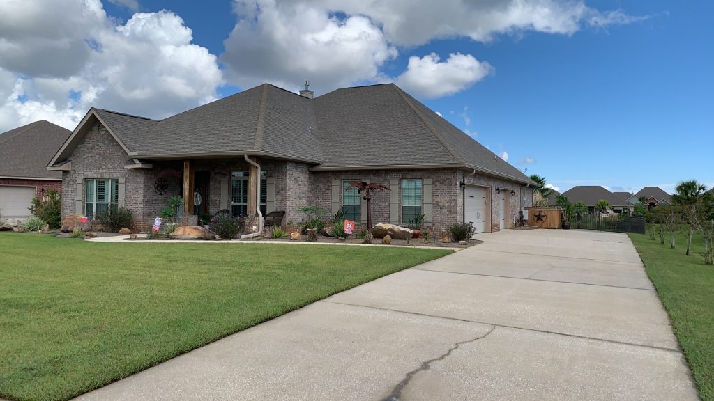 Pressure Washing a driveway in Gulf Shores